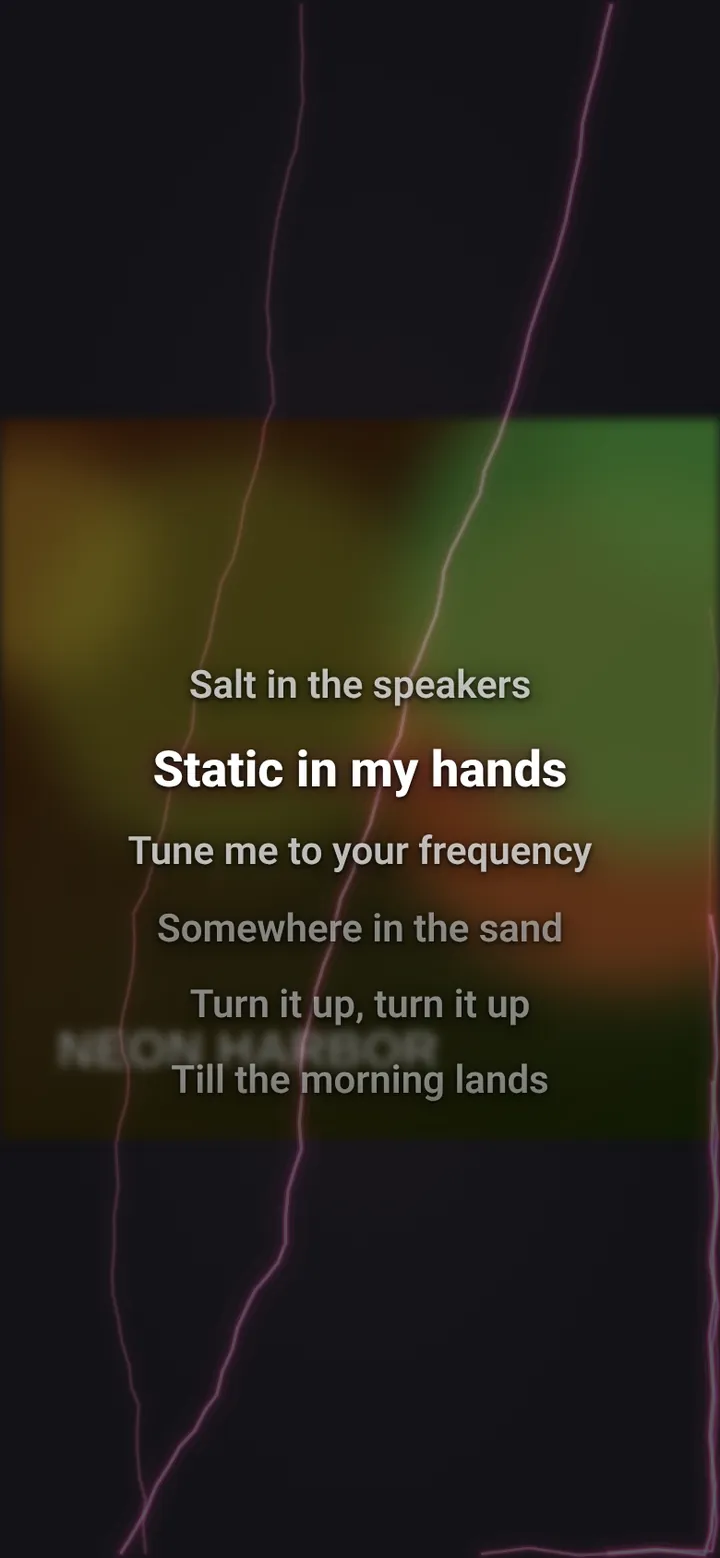 Full-screen album art, softly dimmed, with synced lyrics scrolling on top